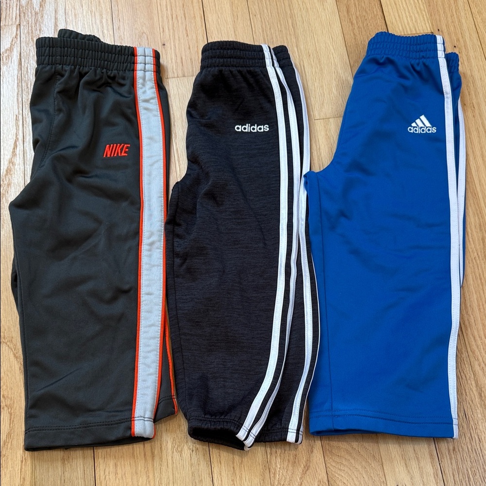 Nike & adidas Kids Black Joggers with White Side Stripes 24 months